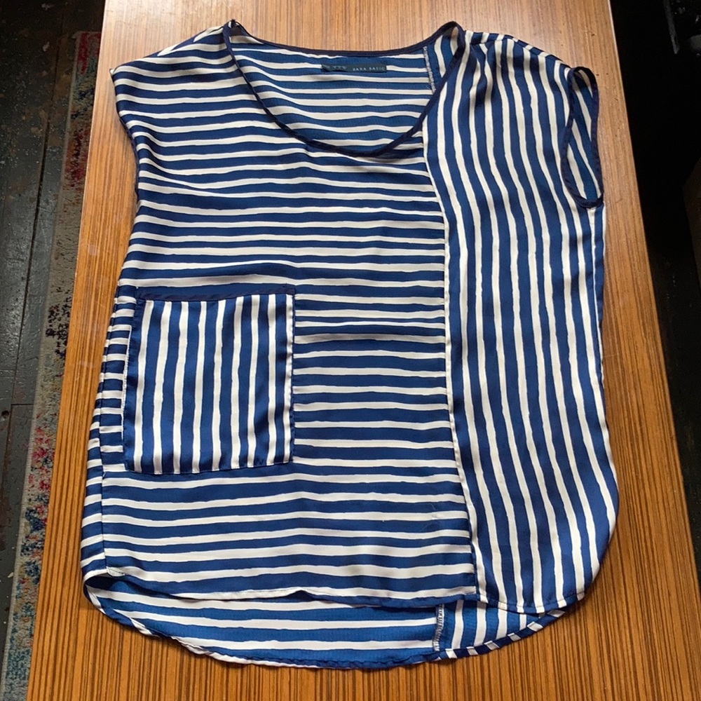 Blue striped sleeveless asymmetrical shirt